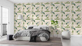 Elegant bedroom featuring peacock patterned wallpaper, comfortable bed, and soft decor